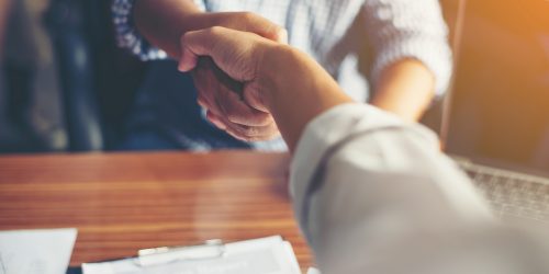 Business People Handshake Greeting Deal at work.